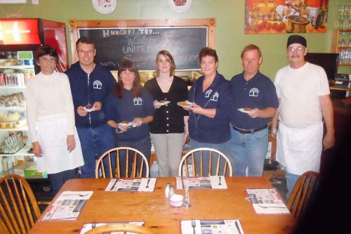 l-r staff from The Maples Restaurant and NFCS: Lorette, Don, Maribeth, Emily, Jan, Mike and Phil served up a hearty spaghetti diner at their annual United Way fundraiser at the Maples Restaurant on November 17